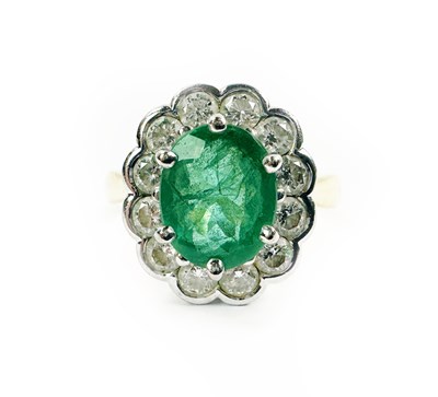 Lot 357 - Emerald and Diamond Cluster Style Ring.