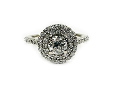 Lot 218 - Double Halo Diamond Ring.