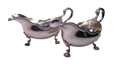 Lot 475 - A Fine Pair of Gravy Boats.