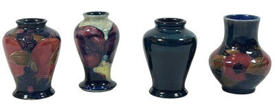 Lot 204 - Moorcroft Group of 4 Miniature Vases Including One Trial Vase.
