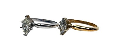 Lot 19 - A Pair of Diamond Rings.