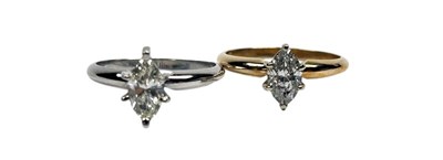 Lot 19 - A Pair of Diamond Rings.