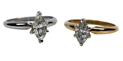Lot 19 - A Pair of Diamond Rings.