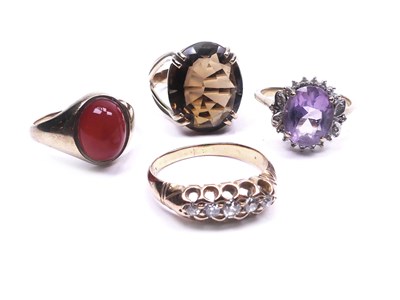 Lot 67 - A Quartet of Yellow Gold Rings.