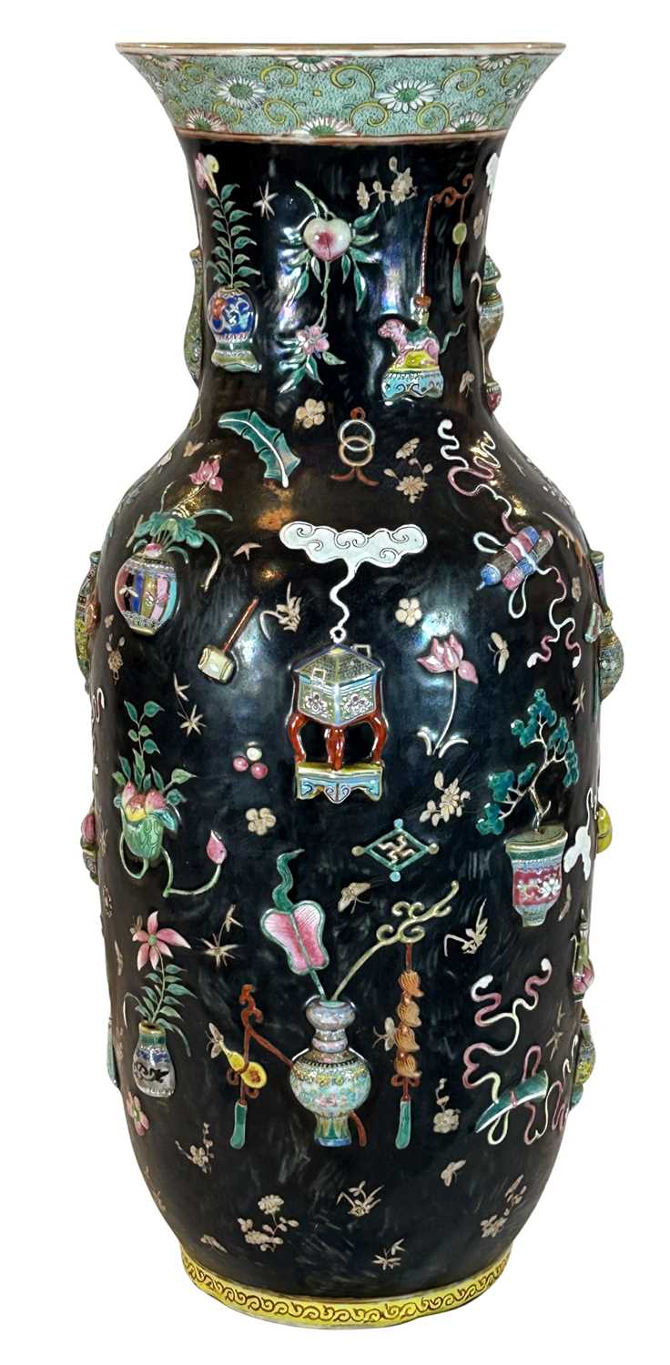 Lot 181 - A Large Famille Rose Relief - Moulded 'One -Hundred Treasures' Vase.