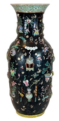 Lot 181 - A Large Famille Rose Relief - Moulded 'One -Hundred Treasures' Vase.