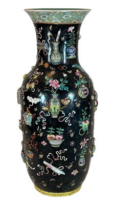 Lot 181 - A Large Famille Rose Relief - Moulded 'One -Hundred Treasures' Vase.