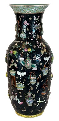 Lot 181 - A Large Famille Rose Relief - Moulded 'One -Hundred Treasures' Vase.