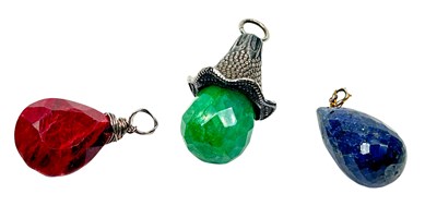Lot 160 - Three Faceted Coloured Gems.