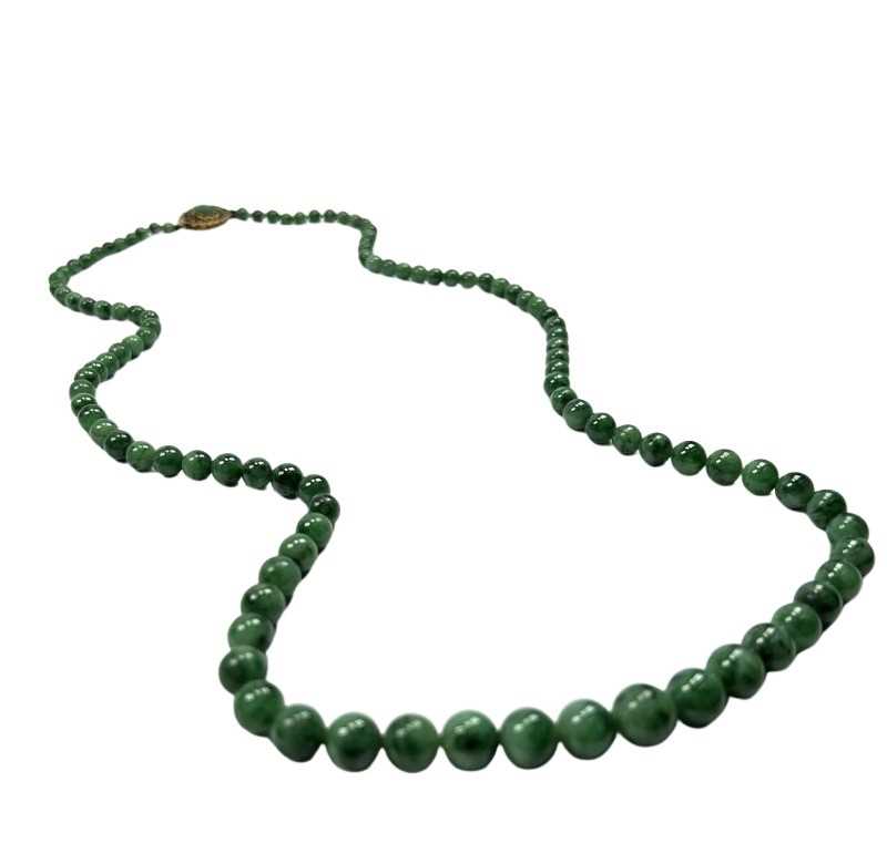 Lot 14 - Jade Bead Strand.