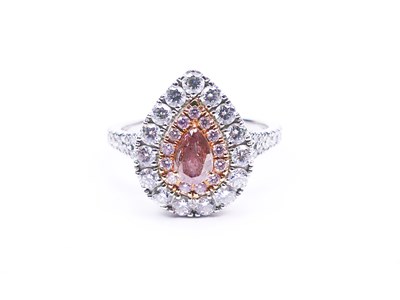 Lot 110 - Pink Diamond Halo Ring.