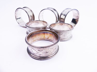 Lot 299 - Six Silver Serviette Rings.