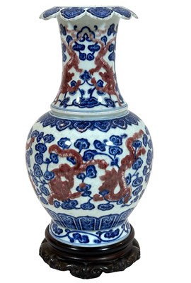 Lot 272 - A Chinese Copper-Red, Blue & White Dragon Vase.