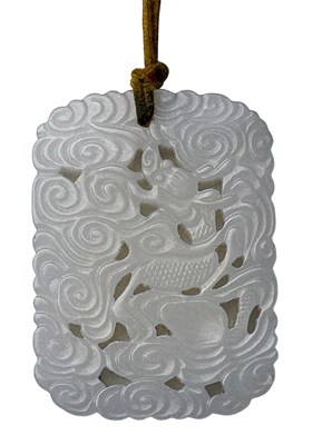 Lot 271 - White Jade Mythical Beast Pendant.