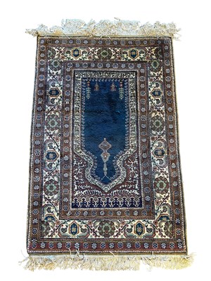 Lot 138 - Prayer Rug in Brown and Blue.