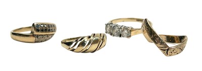 Lot 91 - Four Gold Rings.