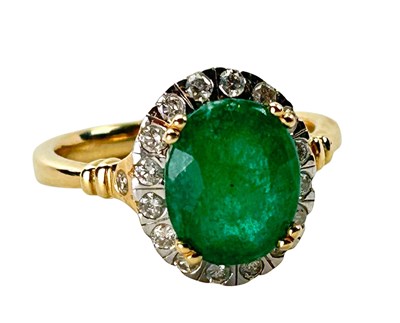 Lot 230 - Emerald and Diamond Cluster Ring.