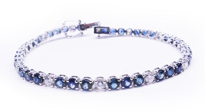 Lot 191 - A White Gold Tennis Bracelet.