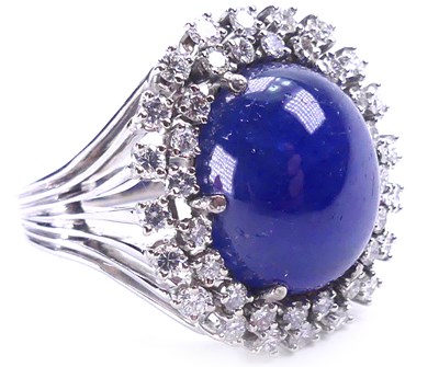 Lot 336 - Large Cabochon Cut Sapphire Ring.