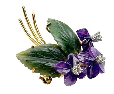 Lot 278 - Jade and Amethyst Brooch.