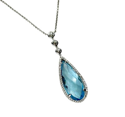 Lot 267 - Aquamarine and Diamond Pendant.