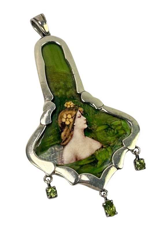 Lot 239 - Arts and Crafts Style Silver Pendant.