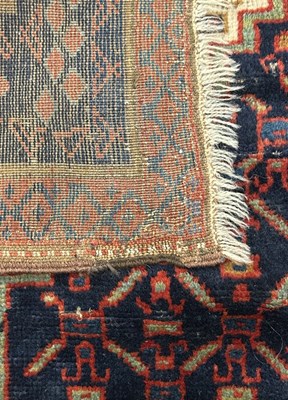 Lot 128 - Hand Knotted Wool Rug.