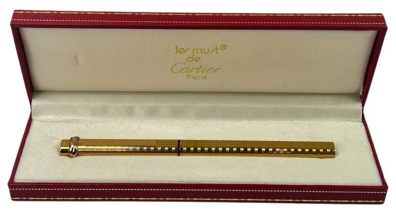 Lot 150 - Les Must De Cartier Gold tone Ball Point Pen.