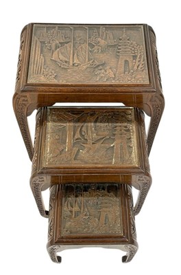 Lot 119 - Three Oriental Carved Nesting Tables.