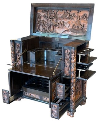 Lot 122 - Carved Teak Drinks Cabinet.