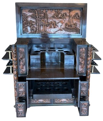 Lot 122 - Carved Teak Drinks Cabinet.