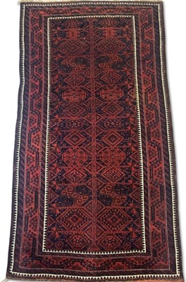 Lot 192 - Afghan Tribal Style Baluch Wool Rug.