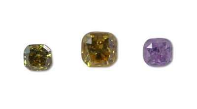 Lot 214 - Three Fancy Coloured Diamonds.