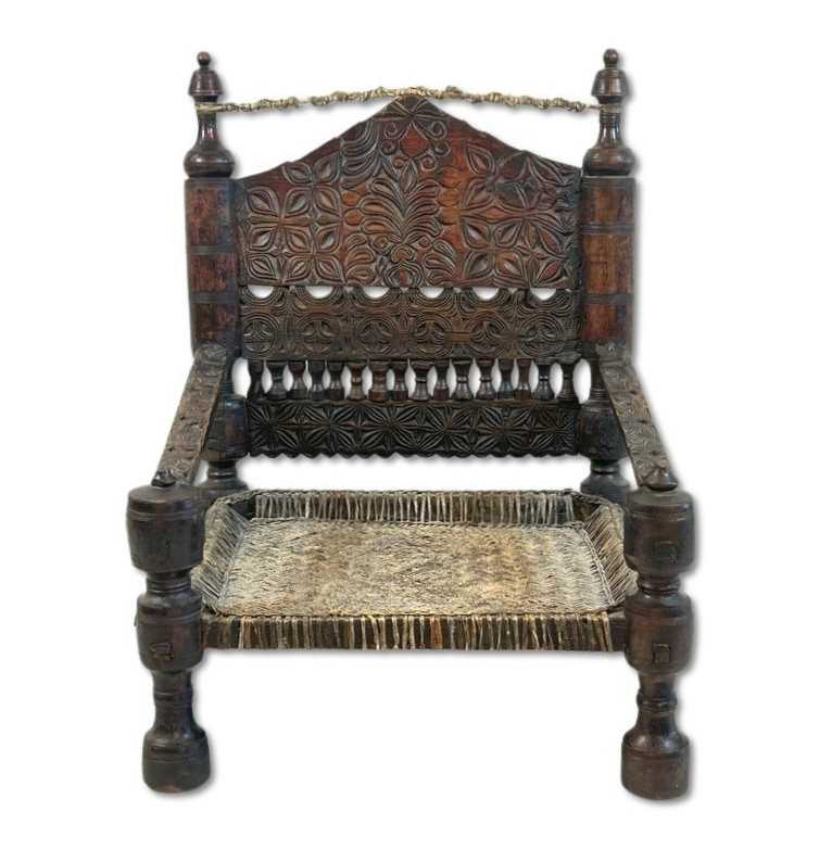 Lot 125 - Hand Carved Traditional Low Chair.