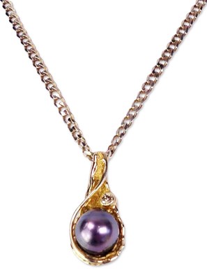 Lot 224 - Pearl and Diamond Pendant.