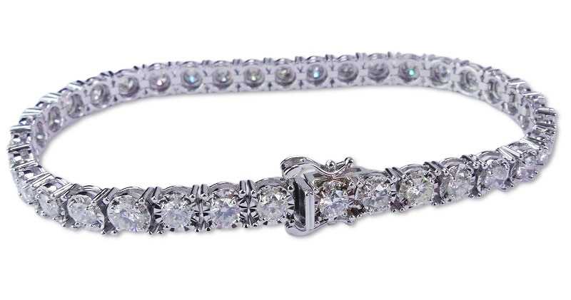 Lot 267 - Diamond Tennis Bracelet.