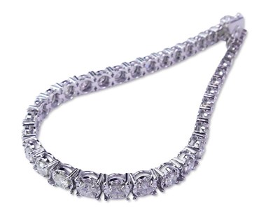 Lot 267 - Diamond Tennis Bracelet.