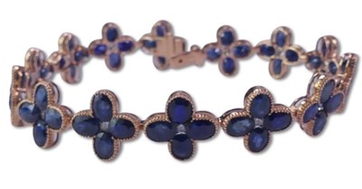 Lot 278 - Sapphire and Diamond Floral Design Bracelet.