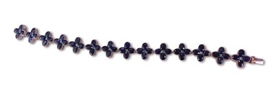 Lot 278 - Sapphire and Diamond Floral Design Bracelet.