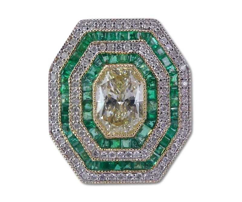 Lot 247 - Diamond and Emerald Statement Ring.