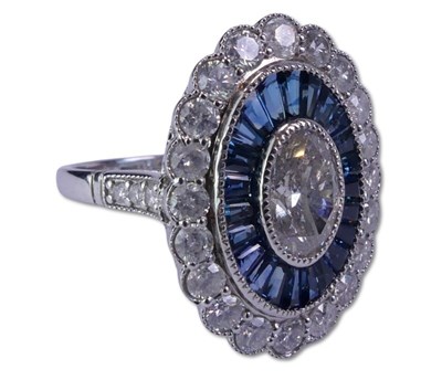 Lot 252 - 14ct White Gold Sapphire and Diamond Cluster Ring.