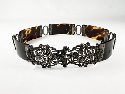 Lot 196 - English made sterling silver and tortoiseshell belt.