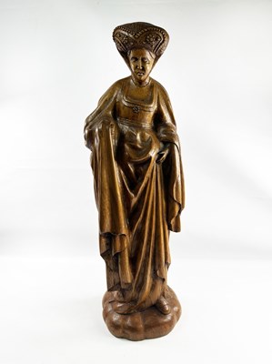 Lot 163 - A Carved Oak Figurine Of A Woman.