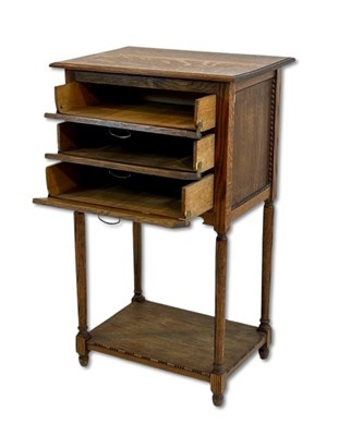 Lot 107 - Oak Music Cabinet.