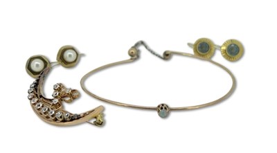 Lot 382 - A Diamond Brooch, Bangle and Earrings.