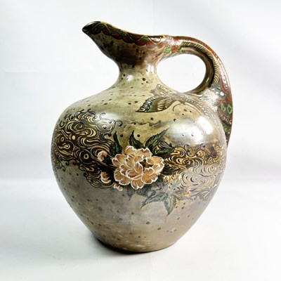 Lot 225 - A Japanese Decorated Earthenware Jug.
