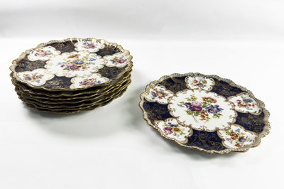 Lot 141 - A Set of 8 Cabinet Plates in the Style of Coalport.