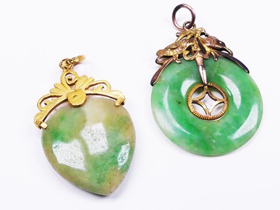 Lot 332 - Two Small Jade Pendants set in Gold.