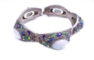 Lot 335 - Jade and Enamel Bracelet.