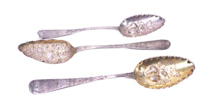 Lot 427 - Three Georgian Berry Spoons.